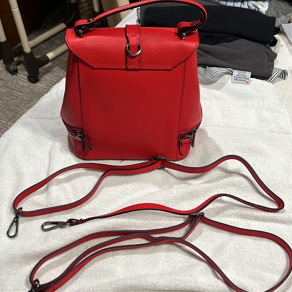Red genuine leather handbag.